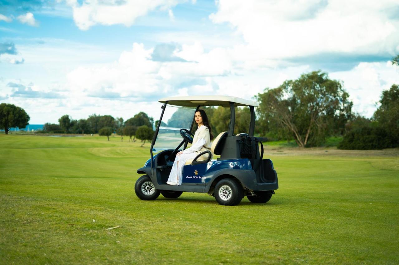 Hotel The View Bouznika Exteriér fotografie Golf cart